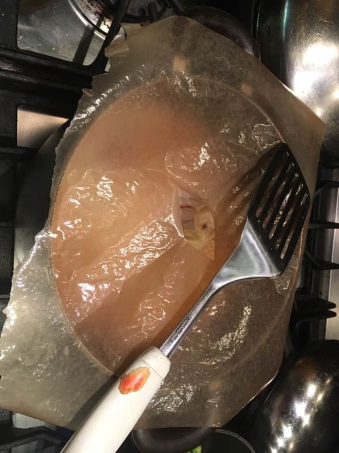 Place a sheet of baking paper with a hole cut in the middle to allow steam to escape above. Cook for 10 minutes. Cooking quickly over high heat in such a way keeps the fish tender.