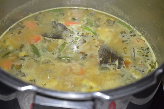 Step eight: Add about 4 cups of water. Bring the mix to a boil. Add remaining salt, pepper powder, sugar (optional), amchur powder (optional). Boil it for 2-3 minutes while stirring occasionally.