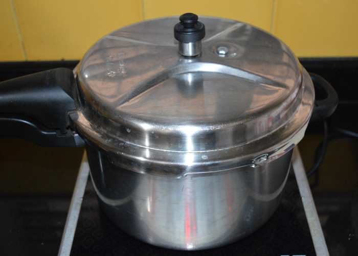 Cook up to a whistle. Simmer for about 6 minutes. Turn off the heat. Open the lid once the entire pressure releases from the cooker naturally.