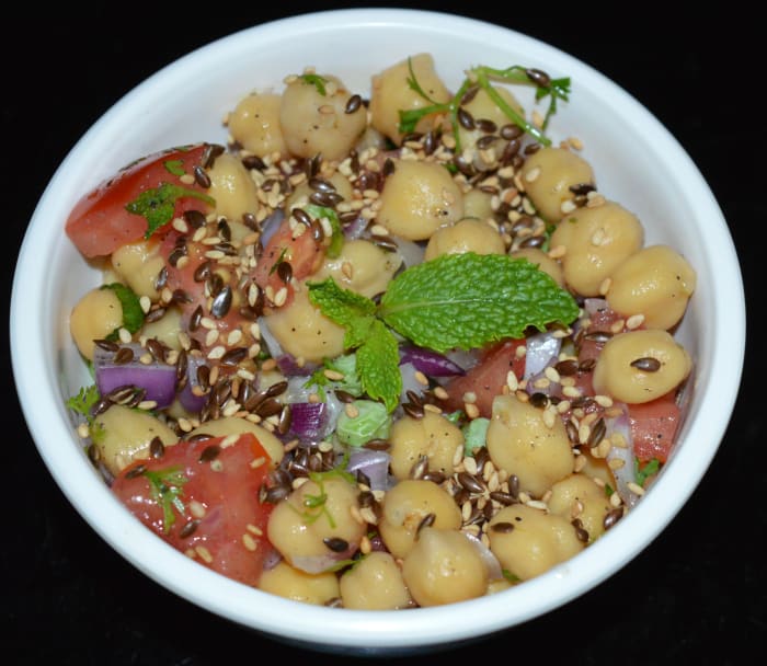 Step five: Serve 2-3 tablespoons of this awesome salad topped with some roasted sesame seeds and flaxseeds. Enjoy eating!