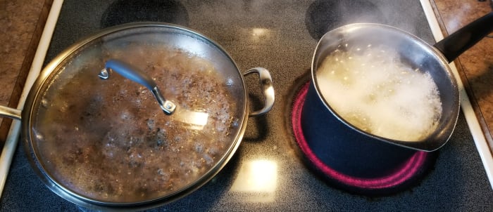 Start boiling potatoes and then brown your ground beef while you wait. Nothing beats homemade mashed potatoes!