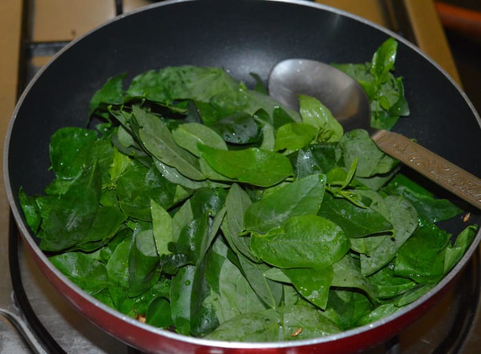 Step three: Add leafy greens and some salt. Saute until the greens cook. You can sprinkle a few drops of water to keep them moist.