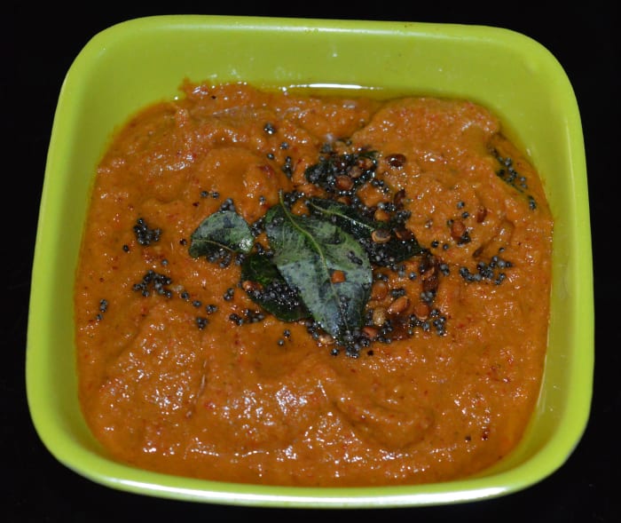 Step four: Add a tempering to it as per instructions. Mix well. Serve this awesome chutney with idli, dosa, or plain rice. Enjoy the taste!