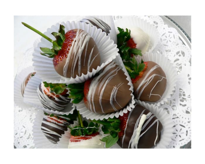Semisweet chocolate-dipped strawberries with a thin white drizzle
