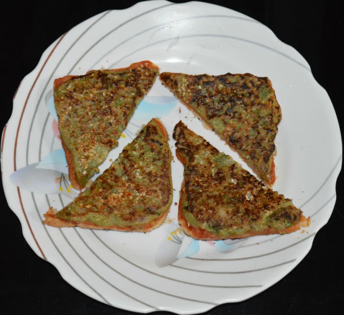 Cut each of them diagonally. Repeat the same for making all the toast. Enjoy eating these yummy toasts hot!