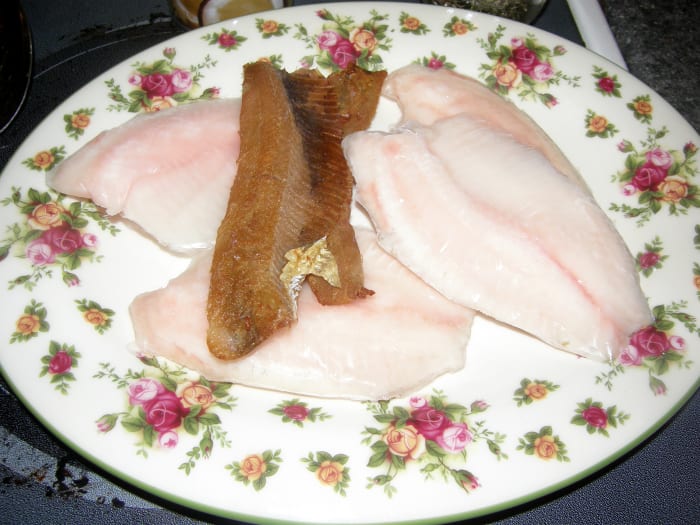 For this recipe, I used frozen whiting as well as some smoked herring. The fish should be added toward the end of the cooking process because otherwise it will break up too much and disintegrate into the broth.