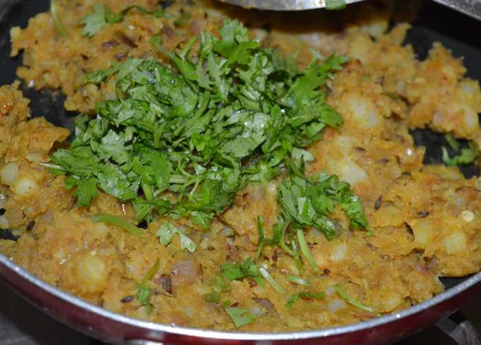 Add finely chopped coriander leaves. Combine with the potato mixture. Turn off the heat. Set mixture aside to cool.