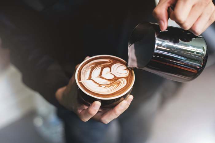 These days, many baristas adorn the foam atop cappuccinos and lattes with designs known as "latte art."