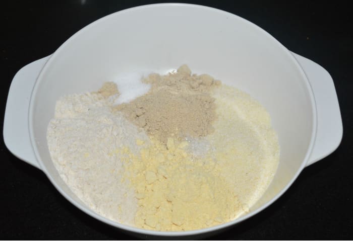 Step one: In a large mixing bowl, add all the ingredients listed under "for the batter," except lemon juice and baking soda.