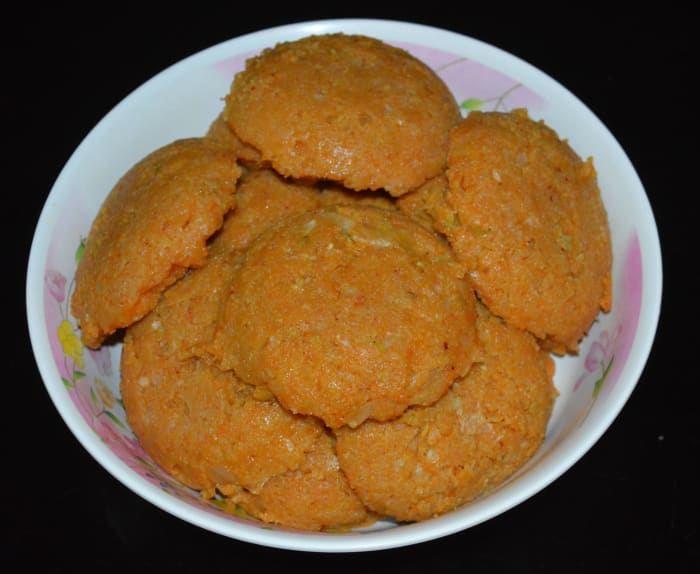 Step 5: When it cools down, run a knife along the edges of the idli. Take them out and arrange on a plate. Your favorite spicy cabbage idli is ready to serve! Serve them warm or hot with coconut chutney or tomato sauce. Enjoy the goodness!