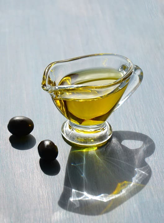 When making your own salad dressing, consider using vegetable oil or olive oil to balance out the tangy flavor from the red wine vinegar.