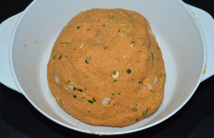 Step 3: Add water little by little in order to prepare a smooth and firm dough. Cover the dough with a damp cloth or plate.