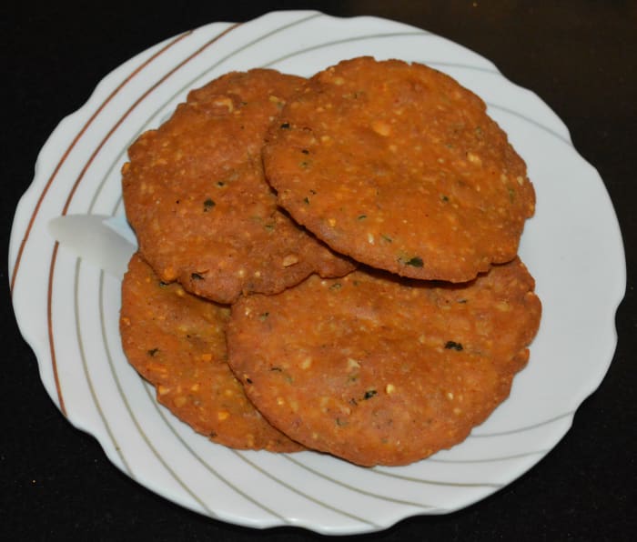 Step 6: Remove and place them on an absorbent paper towel. The yummy nippattu is ready! Repeat the same with the remaining dough. Allow them to cool completely. Store in an airtight container for over a month.
