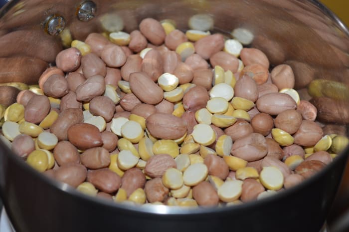 Step 2: Add peanuts and fried gram to a mixer or blender. Pulse 2 or 3 times to obtain a rough mixture.