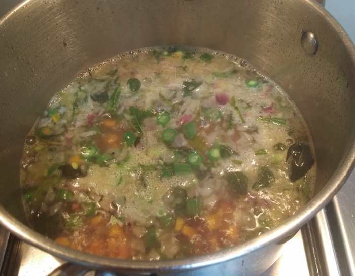 Close the lid and in medium flame boil water. Lower the flame and cook till vegetables turns soft. ( If you like to have upma with crunchy vegetables, don't cook them much).