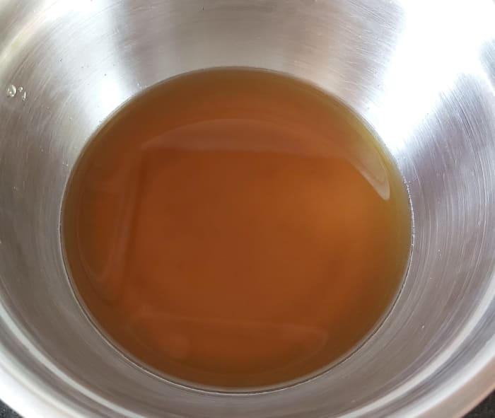 Dissolve jaggery in water completely. Strain using a filter or mesh to remove impurities if any. Set aside.