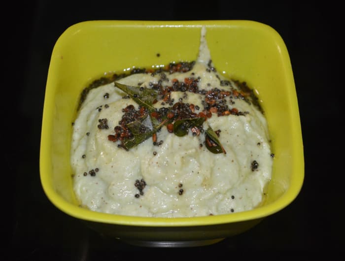 Step two: Add the tempering as per instructions. Mix well. Serve the chutney with steamed rice, idli, dosa, etc. This chutney goes well with all types of meals. Enjoy!