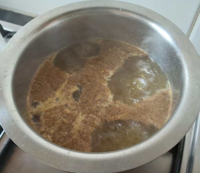 Add prepared pepper rasam powder and allow to boil for 3-4 minutes over medium heat (do not boil too much as the pepper will lose its flavor).