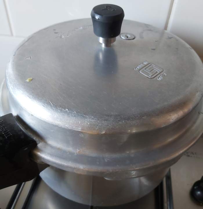 Close the lid and take 3 whistles (depends on the variety of rice you are using). Switch off the flame and let the pressure release by itself.