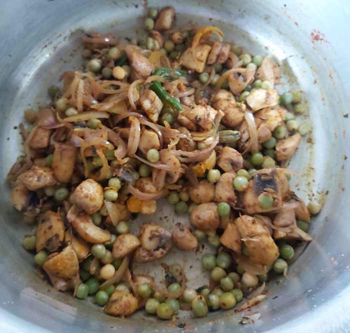 Mix and fry till vegetables coated well with spice powders and raw smell of spice powders goes away.