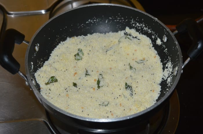 Add semolina. Saute the mixture over low heat until you get a nice aroma from the semolina. This step may take 4 minutes. Transfer the mixture to a plate.