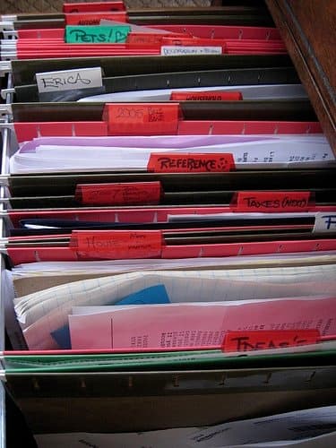 Create a very basic filing system and start putting lesson plans in it. Don't worry about organizing beyond that during your first year of teaching.