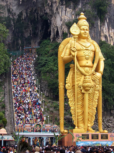 Batu Caves Temple with the famous 272 steps leading to the temple. The 140-feet statue of Lord Murugan took 3 years to complete and was unveiled during Thaipusam festival in January 2006. It was built by 15 artisans from India.