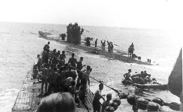 WW2: Shuttle service for shipwrecked persons from the Laconia between U156 (foreground) and U507 (background). 15 September 1942.