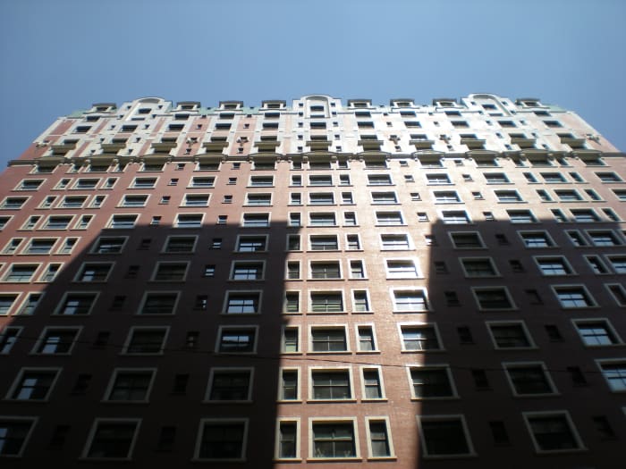 Shadows of neighboring Hilton Chicago on south front of Blackstone Hotel in August 2012.