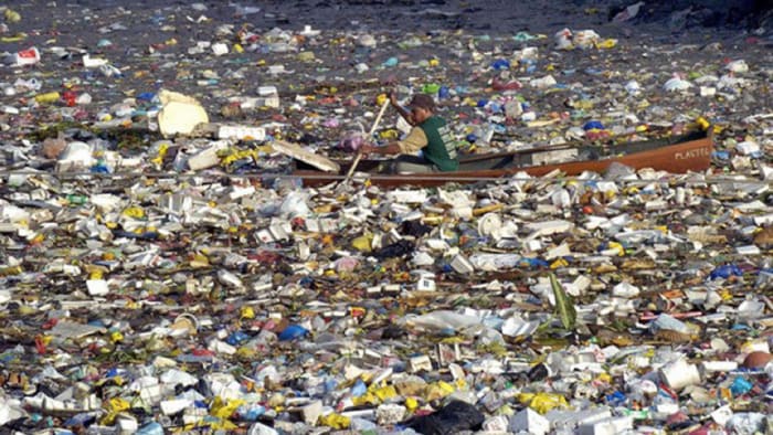 Manila harbour and NOT the Pacific trash island. This photo is often used as an indication of the severity of the "gyre" trash island, but this photo was taken in Manila harbour.