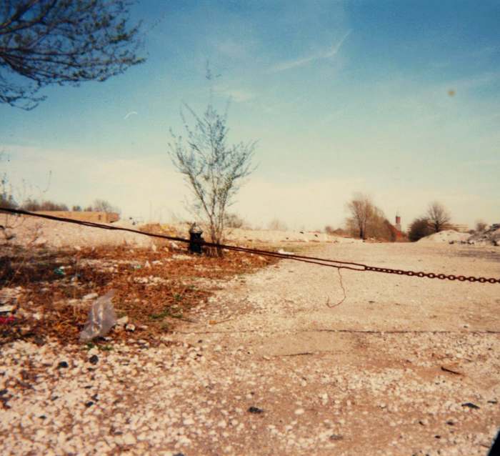 Looking east from 1301 N. Jefferson Avenue, April , 1996. A fire hydrant still stands next to the rubble of what used to be the major street headed into the project.