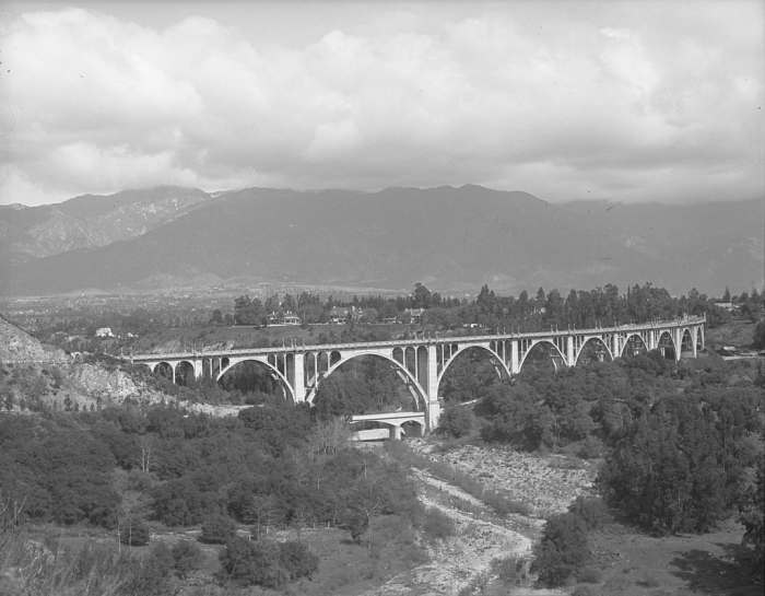 The Colorado Street Bridge, pictured here, is featured in Mildred Pierce. This is the route Mildred takes to Monty's family home in Pasadena.