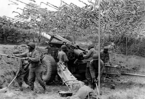 155mm battery, Normandy 1944. One of the most subtle but important changes between the wars was the use of pneumatic tires.