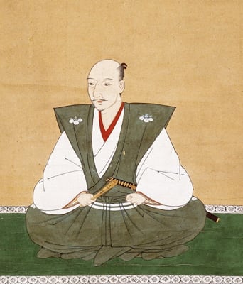 Oda Nobunaga, a famous Muromachi Period warlord, painted here wearing a kataginu, the decorative successor to the hitatare. The stiff fabric makes the shoulders stand up; in later centuries, the shoulders will grow wider and require boning to stand.