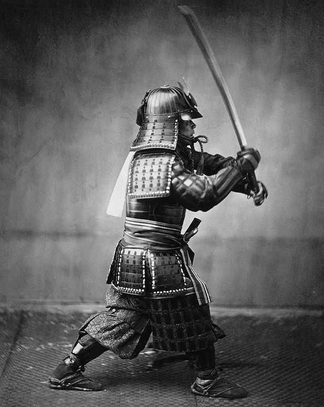 Photo of a Samurai with a sword, taken around 1860. The Samurai were the warrior class in the Japanese social system and beneath the large land owners in the social hierarchy.