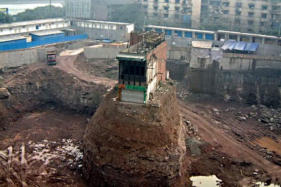The obstinate home owner of Chongqing - The nail house perched on a mound when everything else had gone