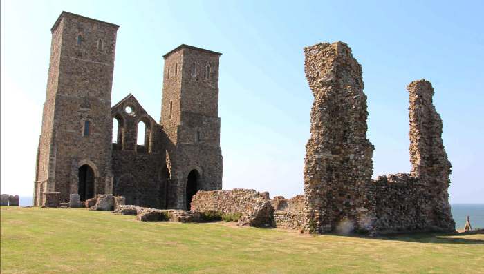 The ruins of the 7th-8th century Reculver Church, its 12th century twin towers (left) and 13th century chancel (right) lie within the grassy field which is the site of the ancient Roman fort. Originally, the towers were topped with wooden spires