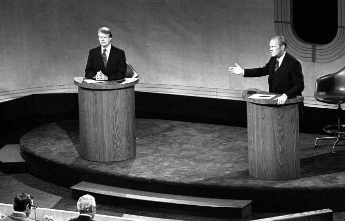 President Gerald Ford and Jimmy Carter meet at the Walnut Street Theater in Philadelphia to debate domestic policy during the first of the three Ford-Carter Debates.