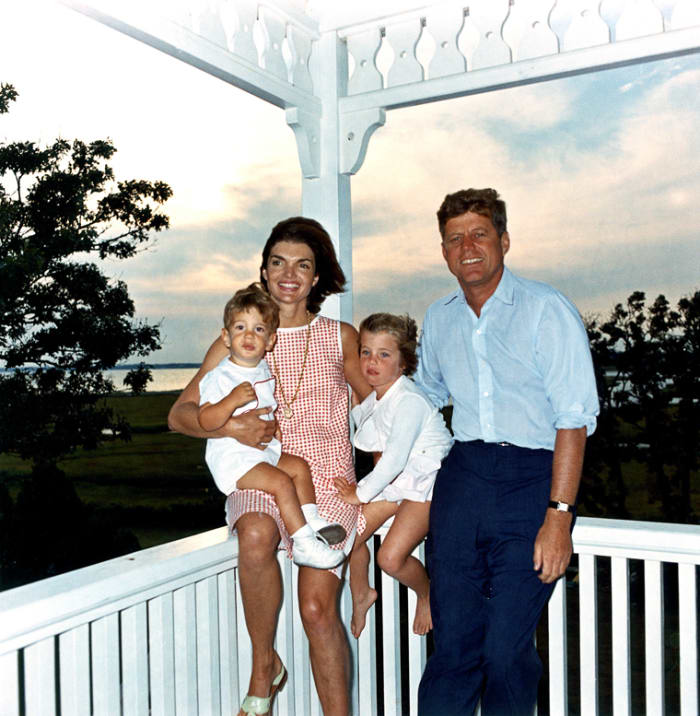 President John F. Kennedy, First Lady Jacqueline Kennedy, and their children John, Jr. and Caroline, at their summer house in Hyannis Port, Massachusetts. August 4, 1962
