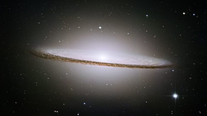 A photo of the Sombrero galaxy (M104). This galaxy is a bright, energetic elliptical galaxy.