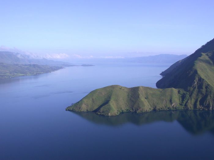 Lake Toba on the island of Sumatra in Indonesia sits on top of the site for the Toba Supervolcano