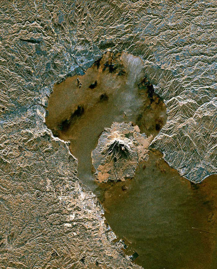 This NASA photo shows Kagoshima Bay with the volcanic island of Sakura-jima situated at the southern end. The whole bay is the remnant of the Aira supervolcano.