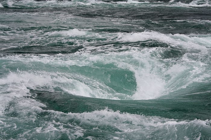 A photograph of the Naruto ocean whirlpool taken from a boat