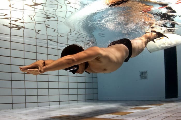 Sometimes people confuse breathing and respiration. This diver is holding his breath. He has voluntarily stopped breathing. But his cells continue to respire to create the energy he needs to swim.