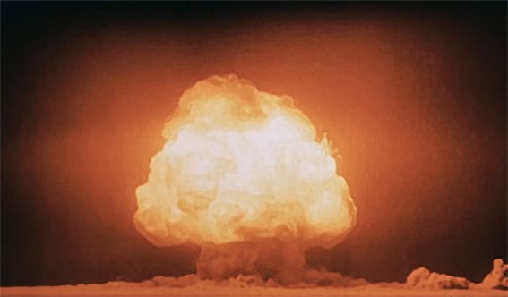 Mushroom cloud of the test of the first atomic bomb at the Trinity test site, seconds after detonation.