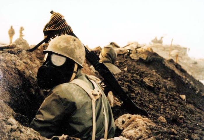 Iranian soldier prepares for gas attack. Chemical weapons were used heavily by Iran and Iraq during the 1980s.