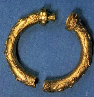 Broighter Collar - a photograph of a gold torque type collar, thought to have been crafted around 100 AD. Possibly belonged to a warrior. Found by Thomas Nicholl in 1896, whilst ploughing a field.