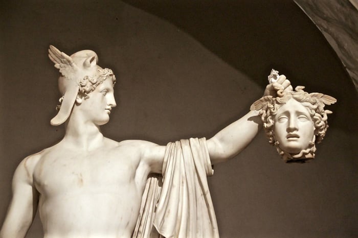 Perseus and Medusa immortalized in marble by Italian sculptor Antonio Canova. The story is one of the most famous Greek myths and a must-know for any Greek vacation.