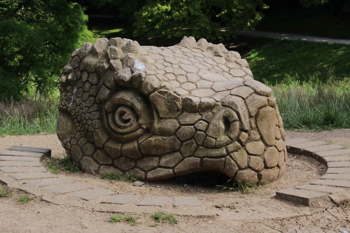 The original skull of a Hylaeosaurus crafted in 1854, now stands on raised ground at one end of the lake (see text later)