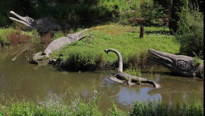 A scenic view - Ichthyosaurs and Plesiosaurs. Today the Crystal Palace statues, the lake and the island make an attractive setting in summer